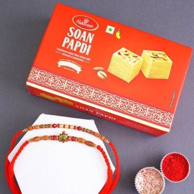 Pearl Rakhi N Golden Tortoise Rakhi With Sweets