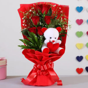 Bunch of 6 red roses N teddy bear arrangement